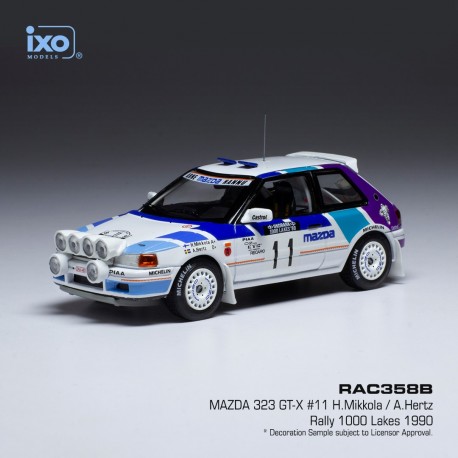 Mazda 323 GTX with night lights 11 Rallyes des 1000 Lacs 1990 Mikkola - Hertz IXO RAC358B
